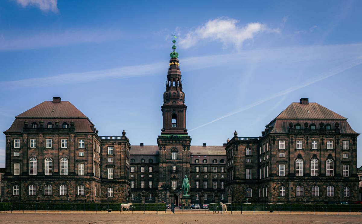 Christiansborg Palace in Copenhagen, seat of Denmark's parliament, under a blue sky