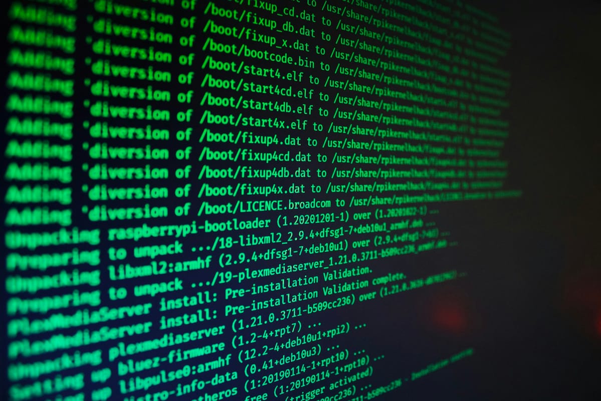 Green Linux terminal output from a package installation scrolling on a dark screen